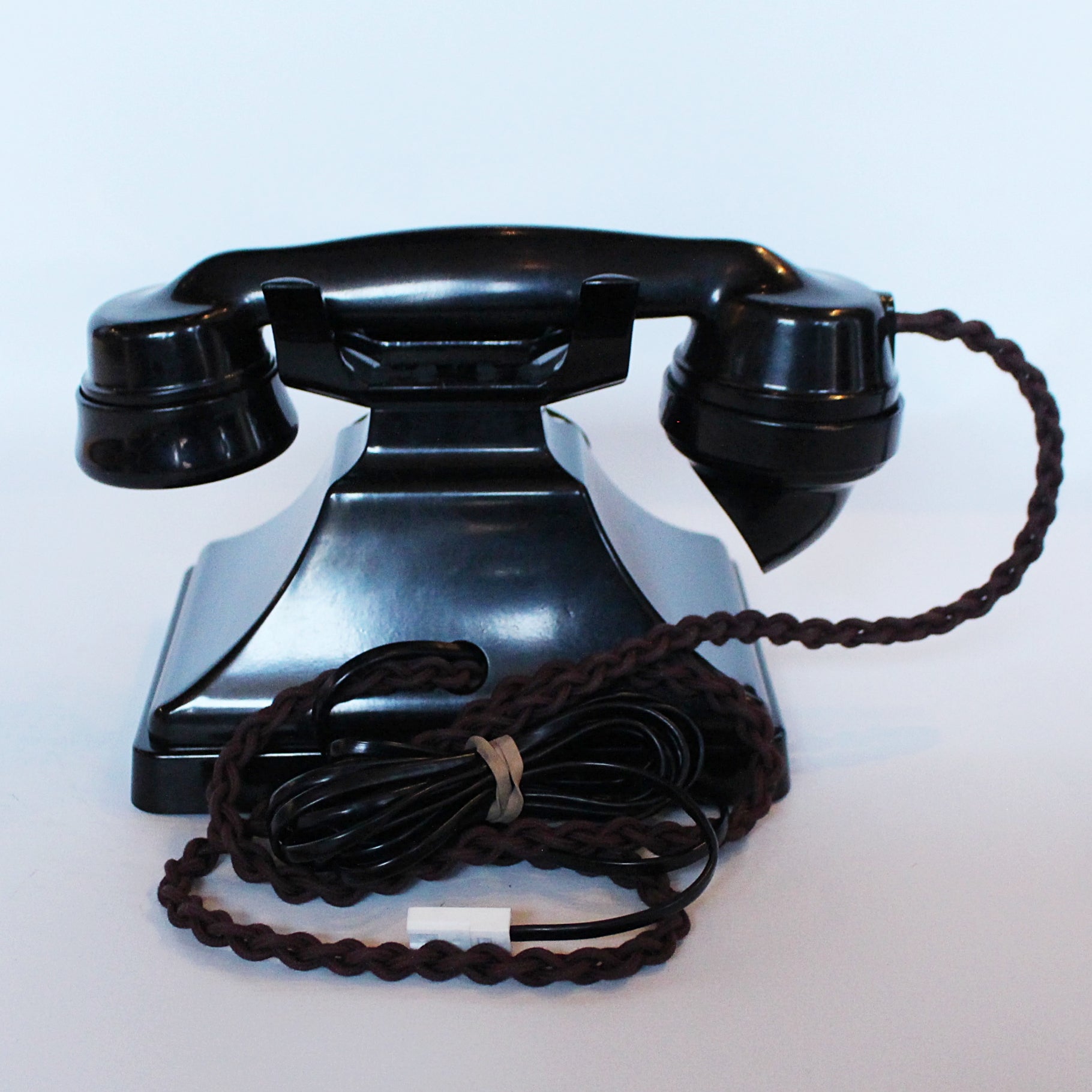 An original GPO telephone in black bakelite. With integral drawer at Jeroen Markies.