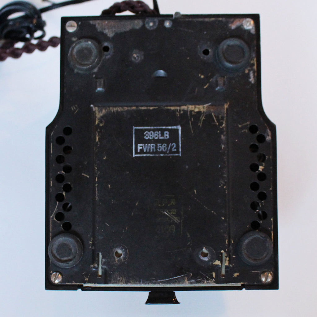 An original GPO telephone in black bakelite. With integral drawer.