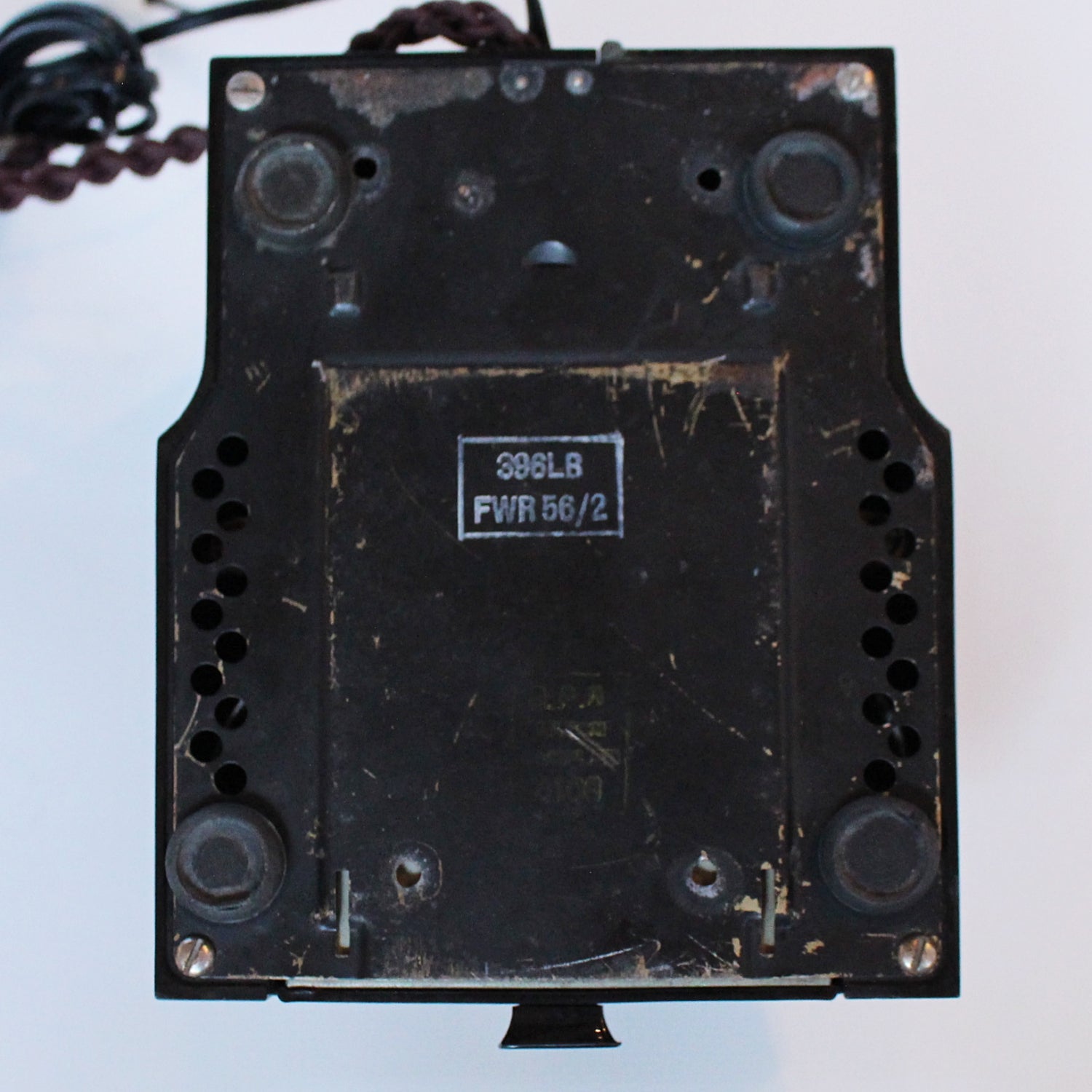 An original GPO telephone in black bakelite. With integral drawer.