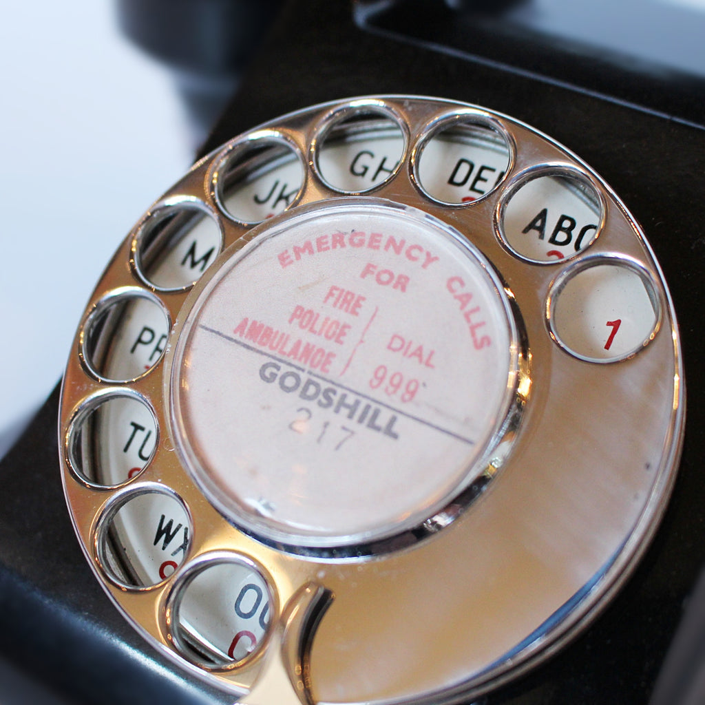 An original GPO telephone in black bakelite. With integral drawer.