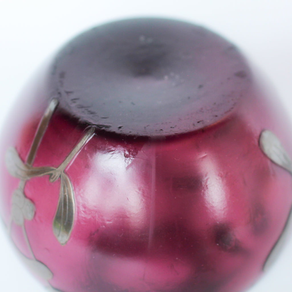 A pair of Art Deco bohemian purple hued glass vases with silver overlay mistletoe design at Jeroen Markies