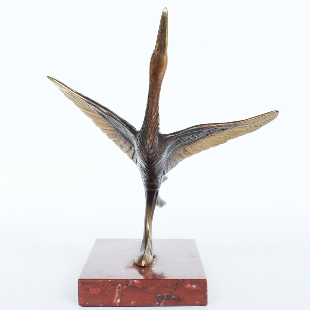 A pair of Art Deco, bronze bookends in the form of two marabou storks. Set over marble plinths. 