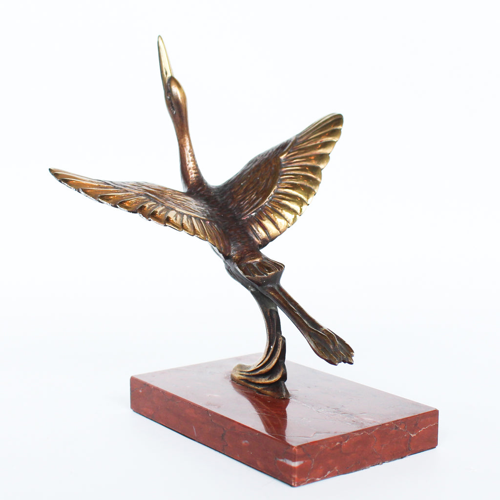 A pair of Art Deco, bronze bookends in the form of two marabou storks. Set over marble plinths. 
