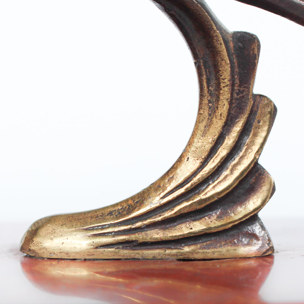 A pair of Art Deco, bronze bookends in the form of two marabou storks. Set over marble plinths. 