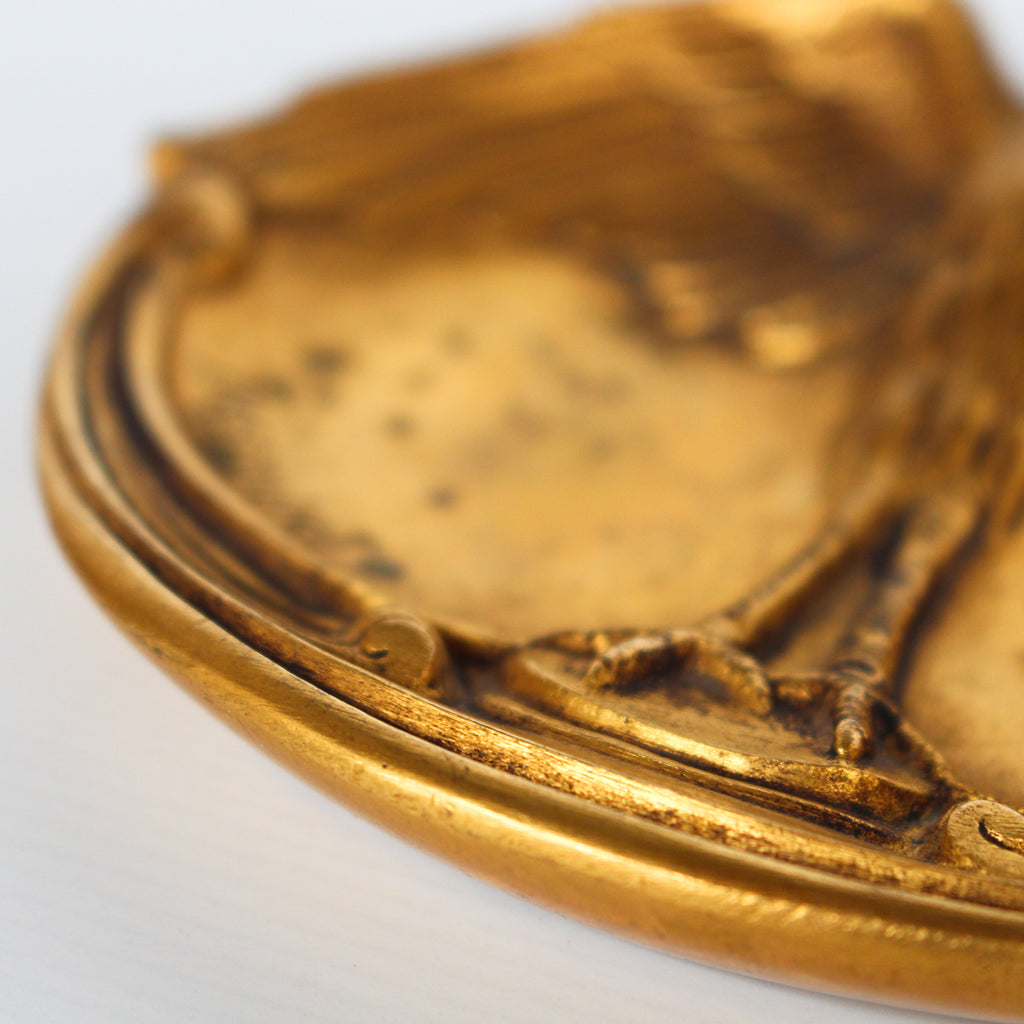 A gilt bronze and onyx in a bird motif, including letter opener and inkwell tray. In fitted presentation case. All signed, "Frecourt". Maurice Frecourt (French 1890) at Jeroen Markies