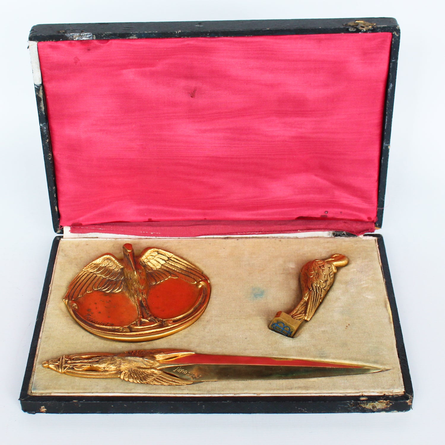 A gilt bronze and onyx in a bird motif, including letter opener and inkwell tray. In fitted presentation case. All signed, "Frecourt". Maurice Frecourt (French 1890) at Jeroen Markies
