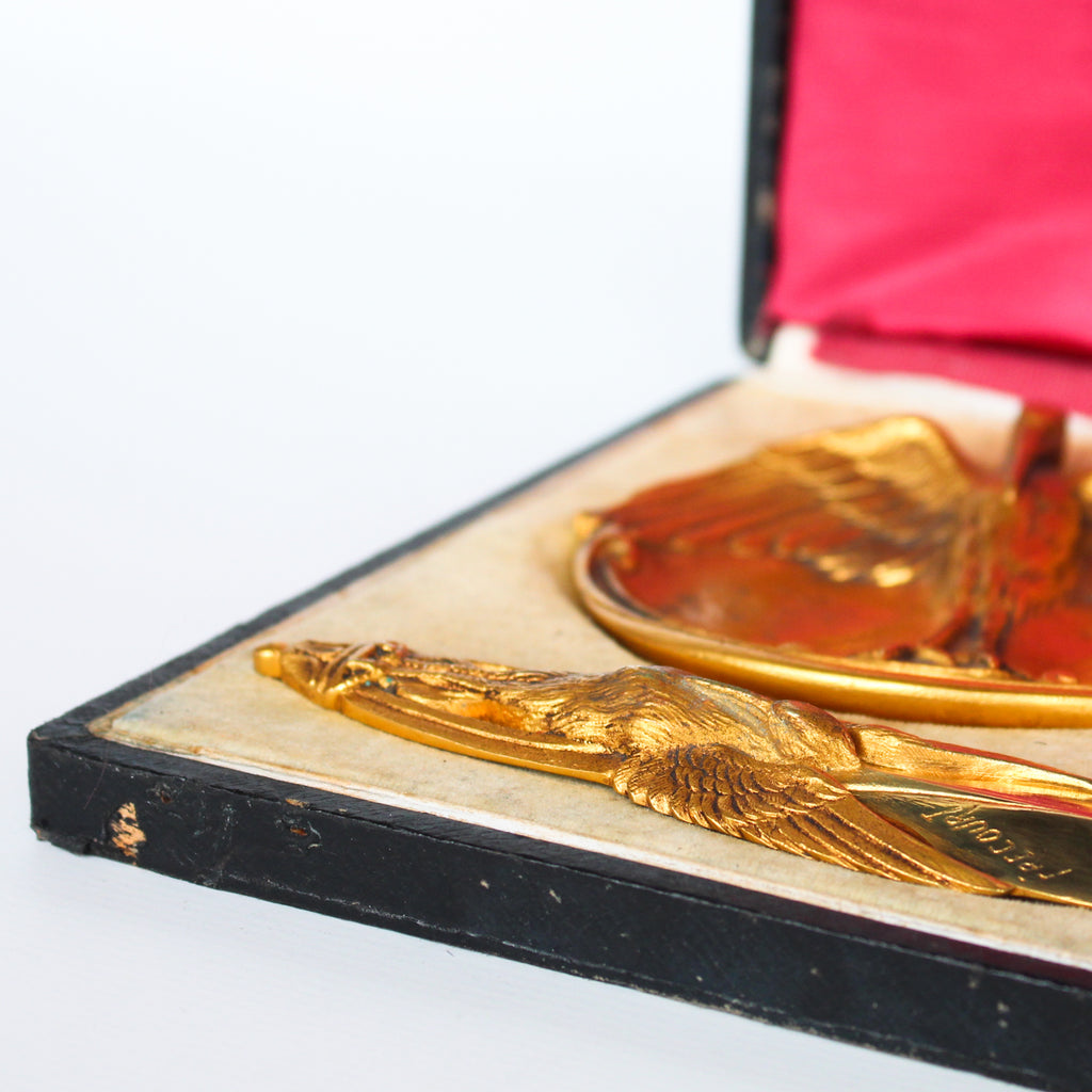 A gilt bronze and onyx in a bird motif, including letter opener and inkwell tray. In fitted presentation case. All signed, "Frecourt". Maurice Frecourt (French 1890) at Jeroen Markies