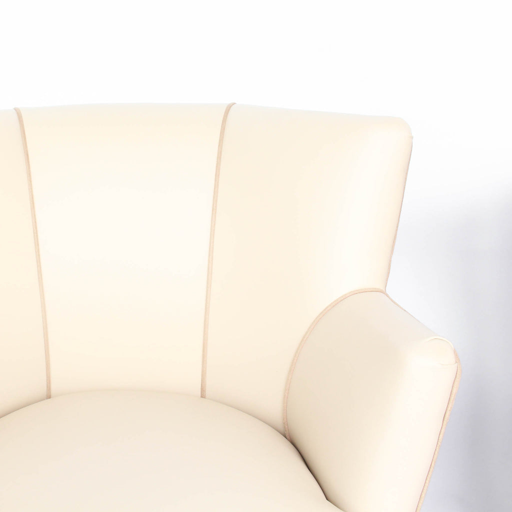 A pair of 1930s three penny piece bedroom/cocktail chairs. Upholstered in cream leather to fronts and faux suede to back and sides with new kendrick chrome casters at Jeroen Markies