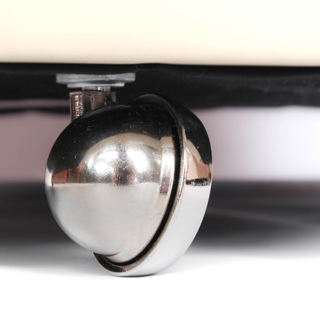 A pair of 1930s three penny piece bedroom/cocktail chairs. Upholstered in cream leather to fronts and faux suede to back and sides with new kendrick chrome casters at Jeroen Markies