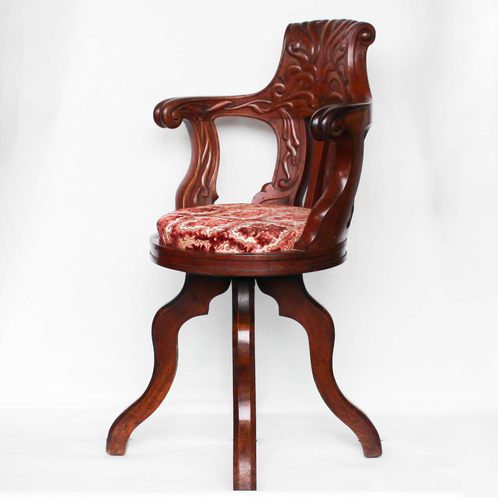 A solid, carved, walnut bar chair from HMHS Britannic, sister ship to the Titanic at Jeroen Markies.