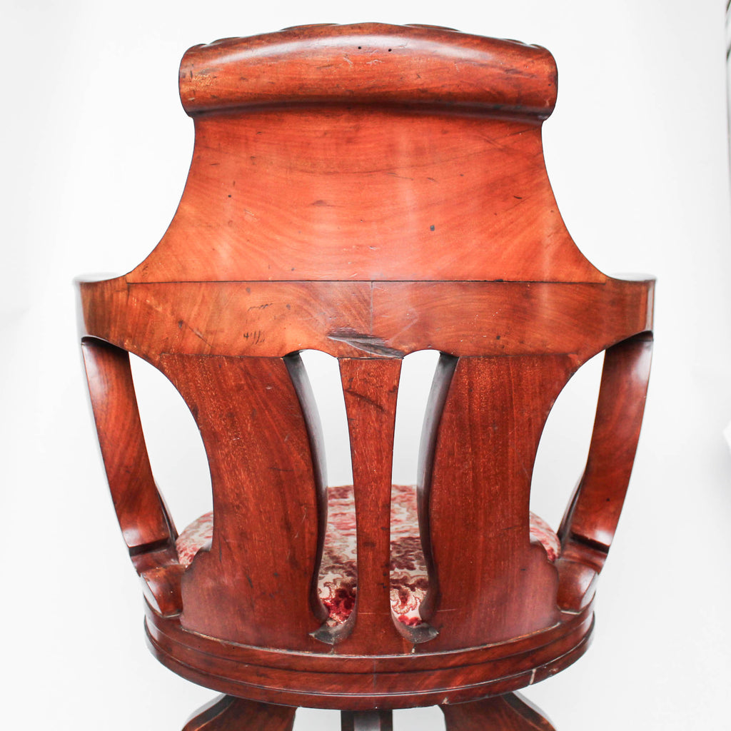 A solid, carved, walnut bar chair from HMHS Britannic, sister ship to the Titanic at Jeroen Markies.