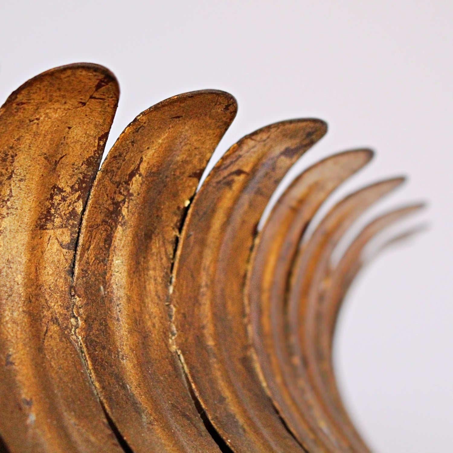 A pair of 20th Century gilt metal and cast iron floor lamps. Iron stem and base. Caged, stylised shades.