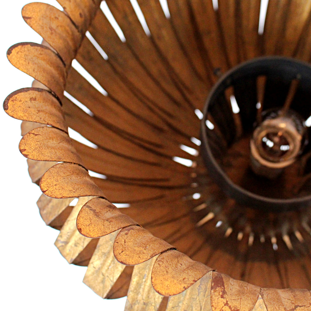 A pair of 20th Century gilt metal and cast iron floor lamps. Iron stem and base. Caged, stylised shades.