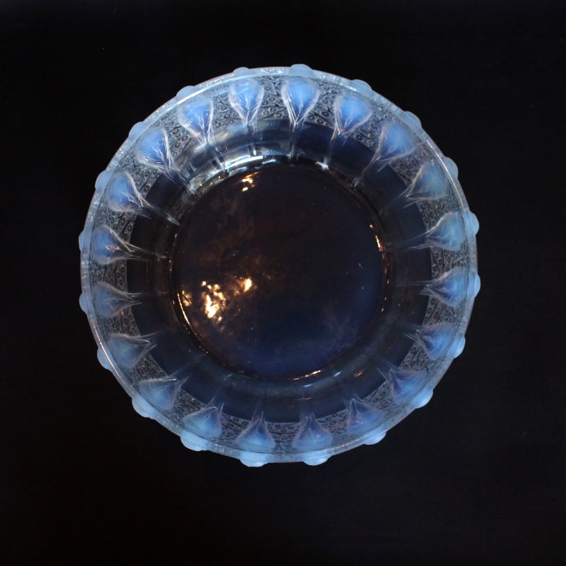 A frosted an opalescent glass bowl depicting parakeets in relief. Hand etched 'R Lalique France' to underside at Jeroen Markies