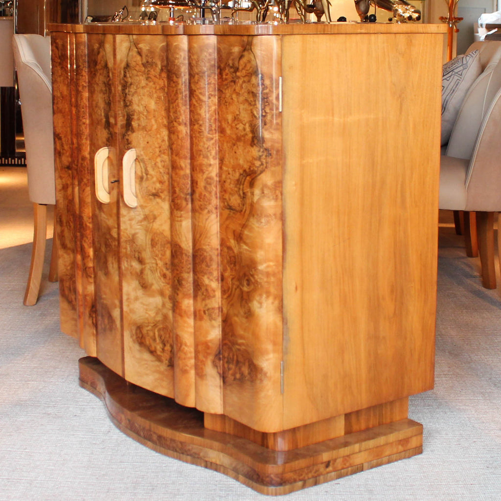 An Art Deco, walnut veneer sideboard by Harry & Lou Epstein at Jeroen Markies