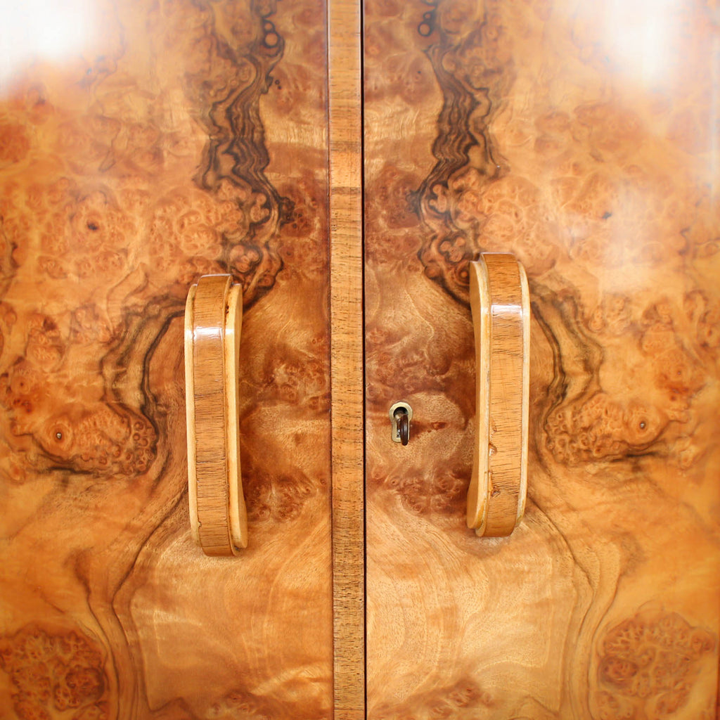 An Art Deco, walnut veneer sideboard by Harry & Lou Epstein at Jeroen Markies