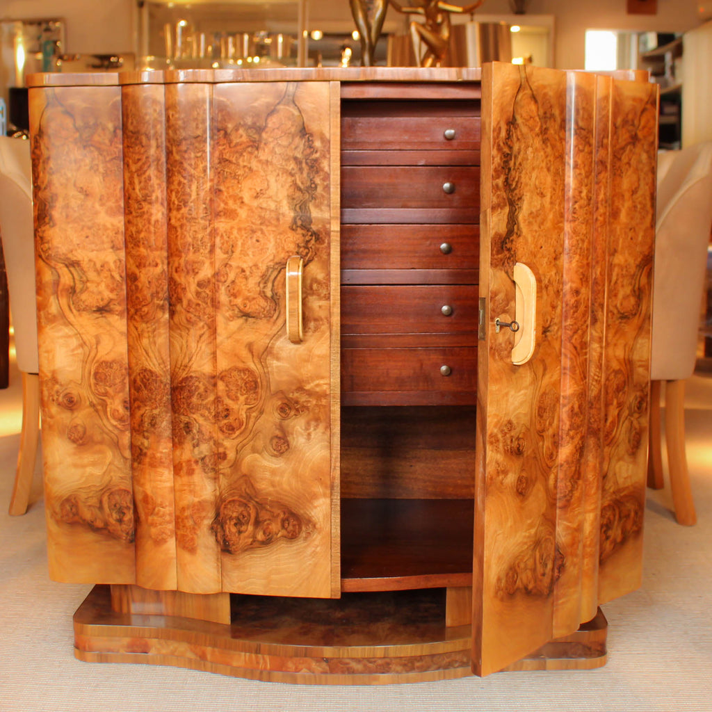 An Art Deco, walnut veneer sideboard by Harry & Lou Epstein at Jeroen Markies