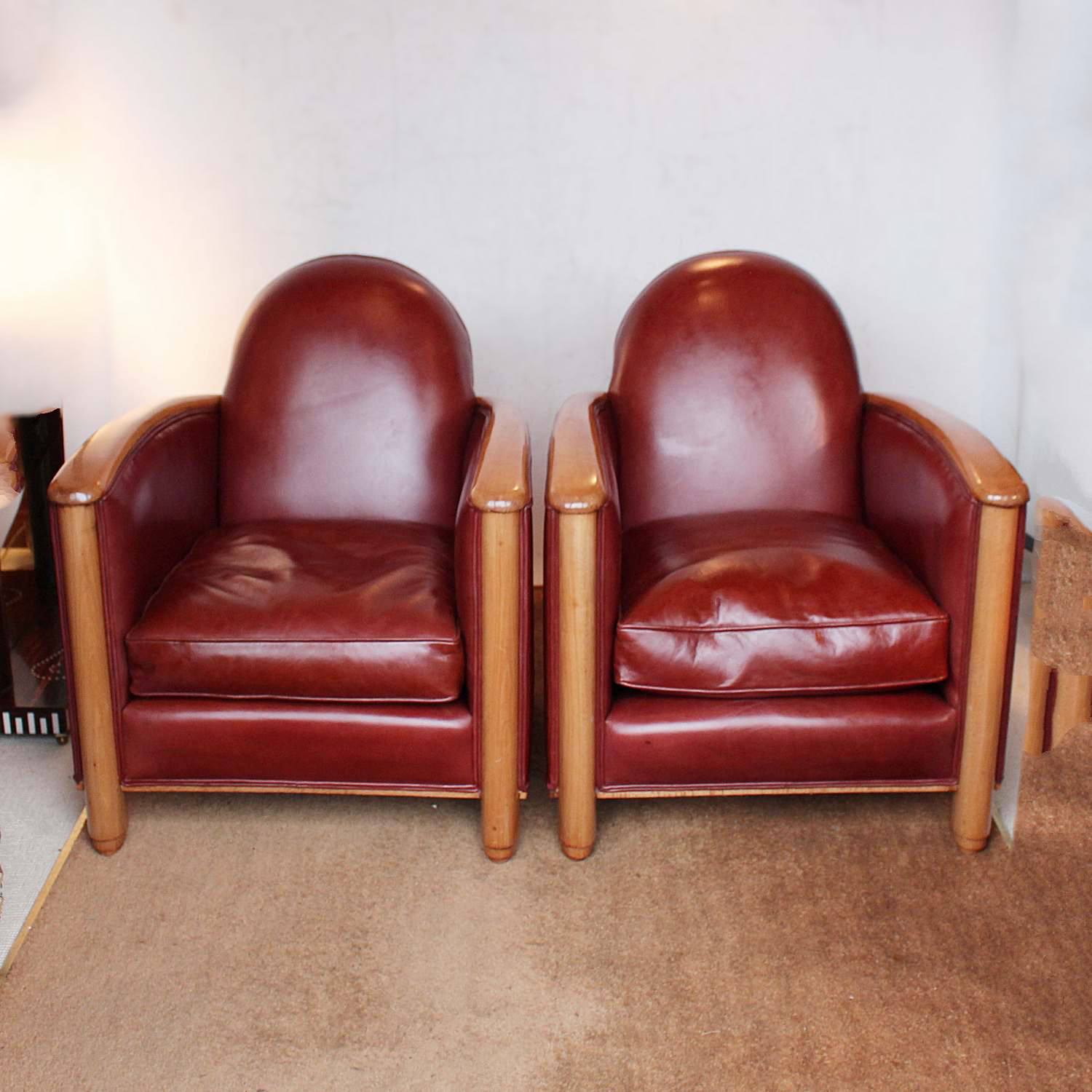 Art Deco tub chairs with fruit wood arms upholstered in chestnut leather at Jeroen Markies