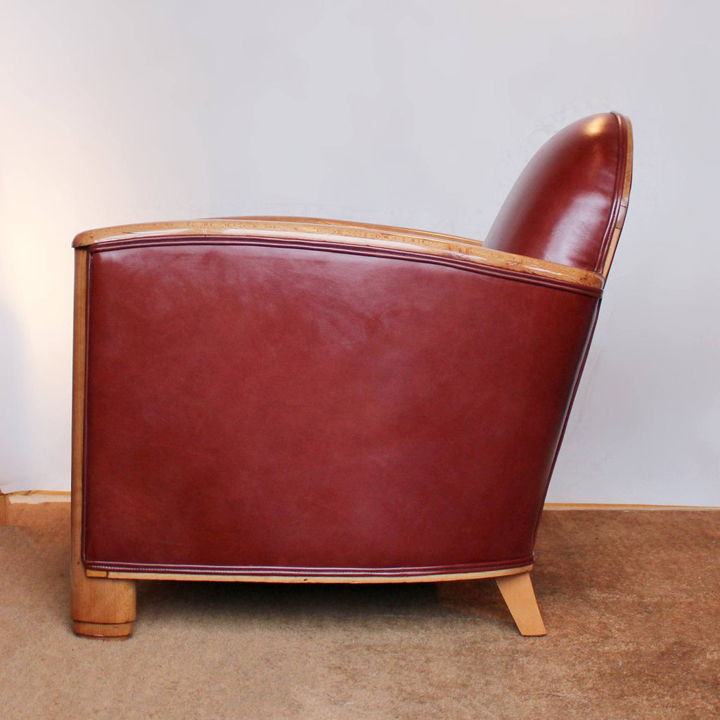 Art Deco tub chairs with fruit wood arms upholstered in chestnut leather at Jeroen Markies