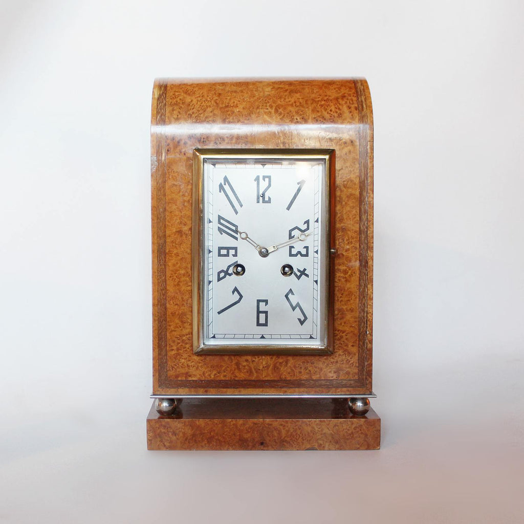 An Art Deco mantel clock in amboyna with metal face circa 1930 at Jeroen Markies 