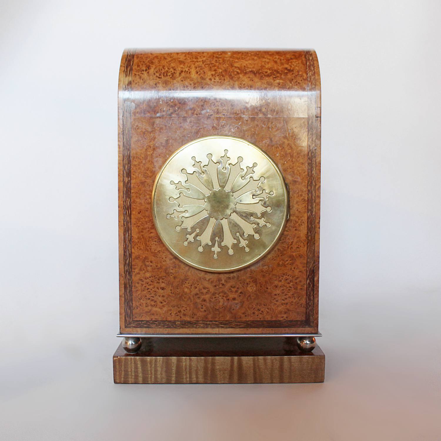 An Art Deco mantel clock in amboyna with metal face circa 1930 at Jeroen Markies 