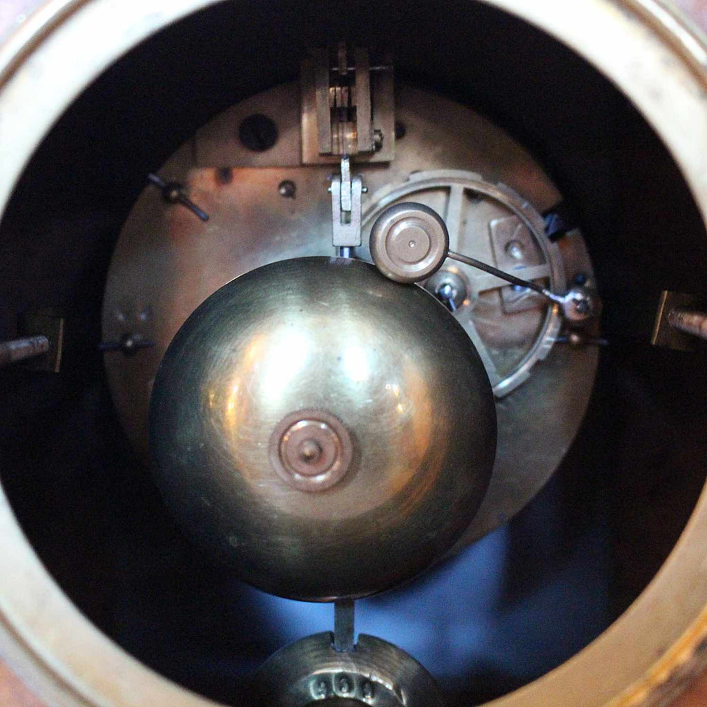 An Art Deco mantel clock in amboyna with metal face circa 1930 at Jeroen Markies 