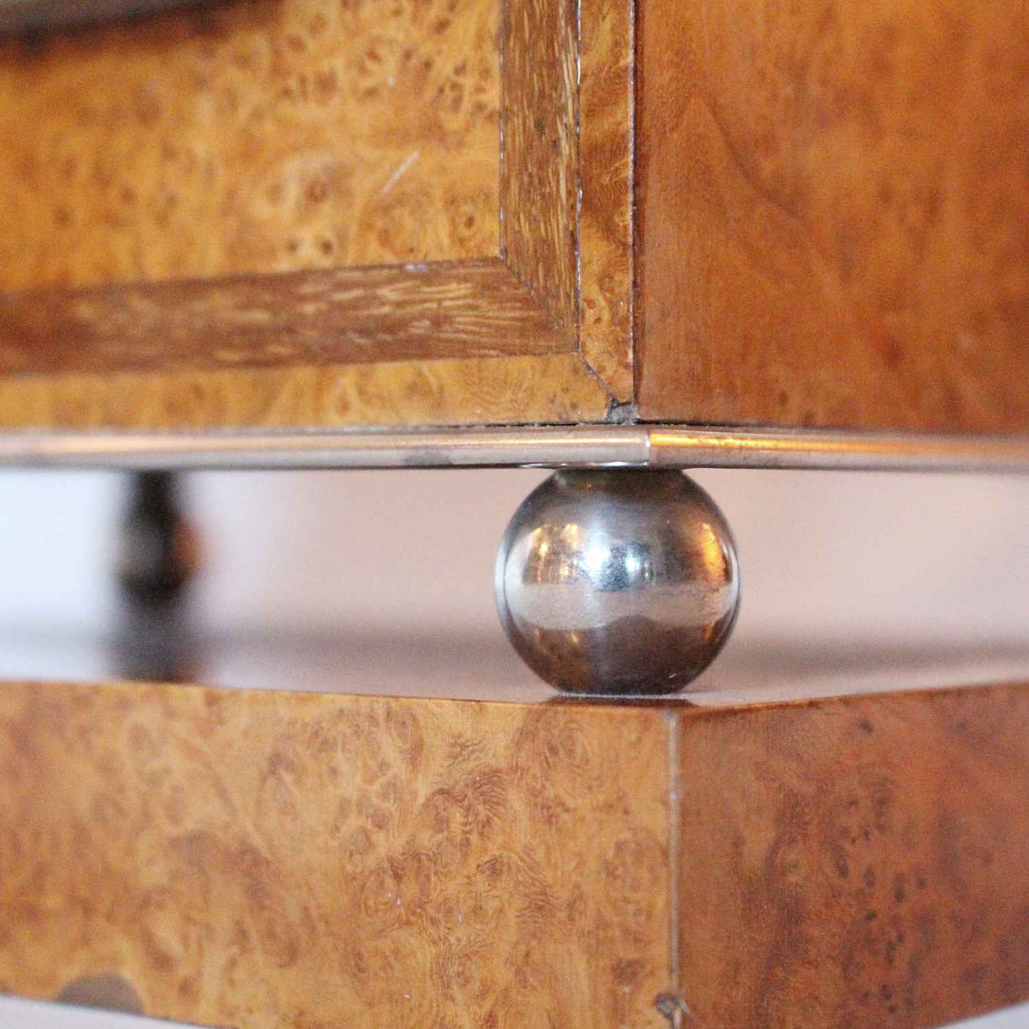 An Art Deco mantel clock in amboyna with metal face circa 1930 at Jeroen Markies 