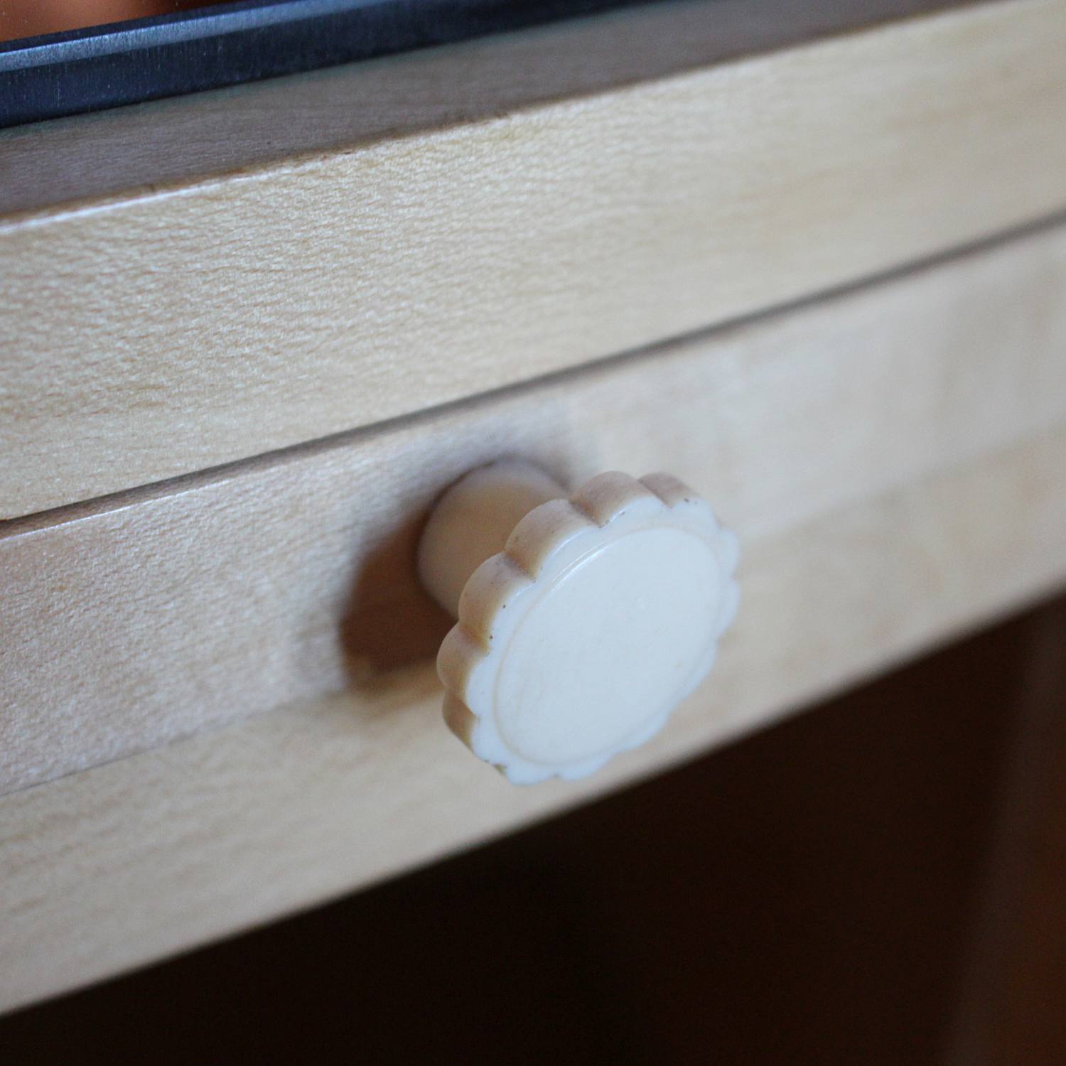Art Deco cocktail cabinet by Harry & Lou Epstein with bow front and peach glass interior at Jeroen Markies
