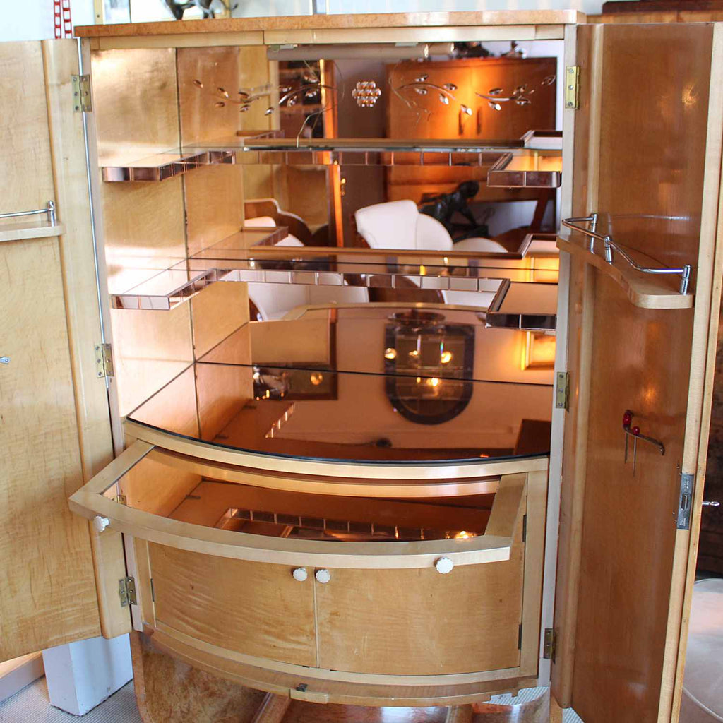 Art Deco cocktail cabinet by Harry & Lou Epstein with bow front and peach glass interior at Jeroen Markies