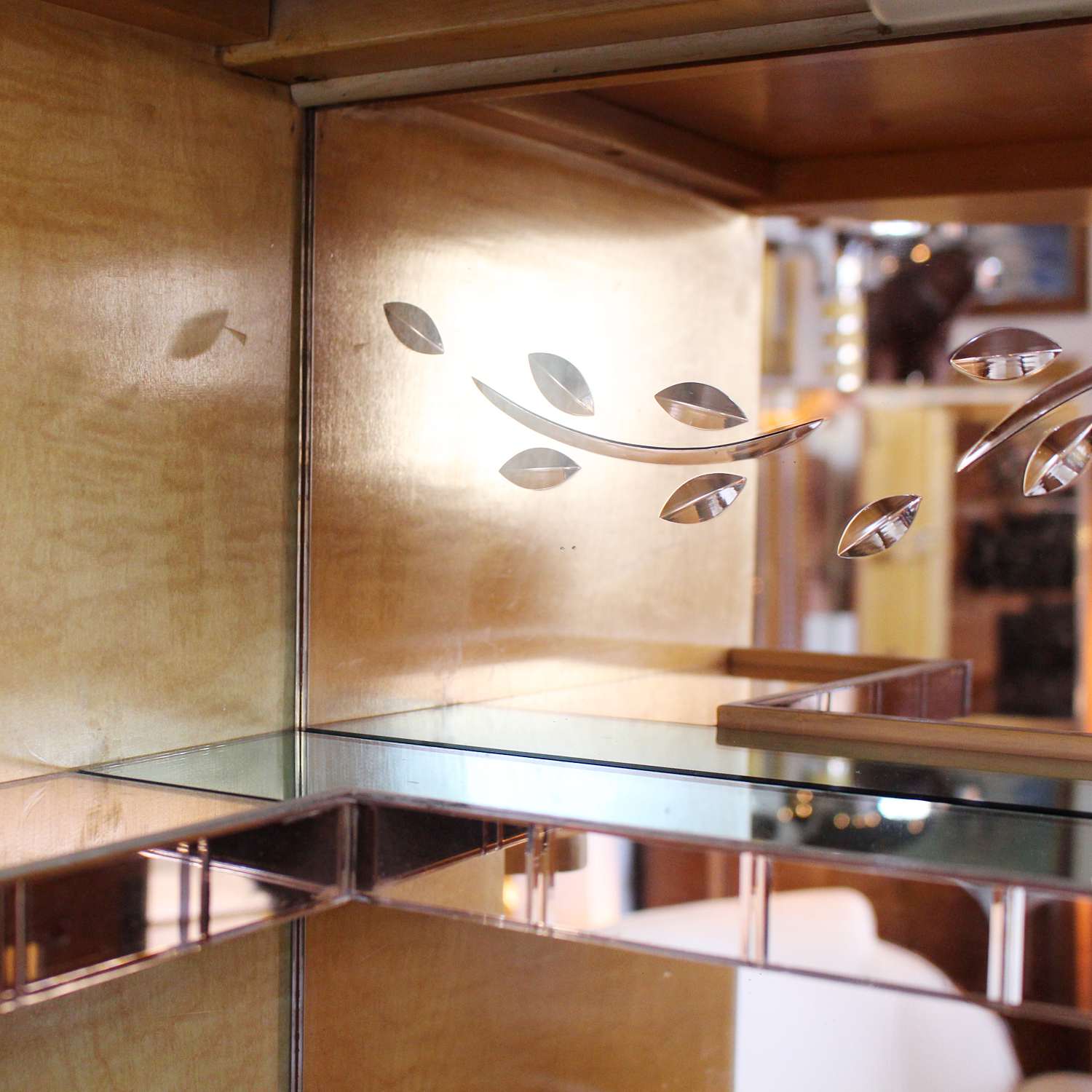 Art Deco cocktail cabinet by Harry & Lou Epstein with bow front and peach glass interior at Jeroen Markies