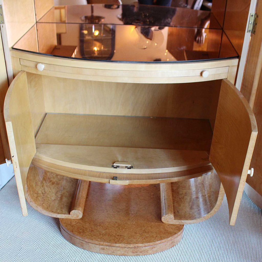 Art Deco cocktail cabinet by Harry & Lou Epstein with bow front and peach glass interior at Jeroen Markies