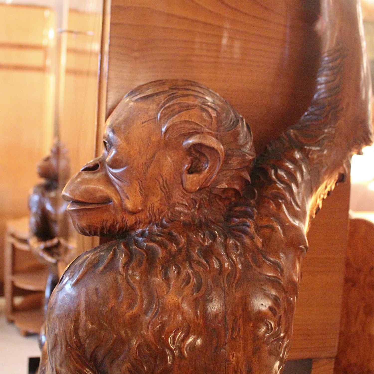 An unusual and unique Art Deco cocktail cabinet with hand carved monkeys