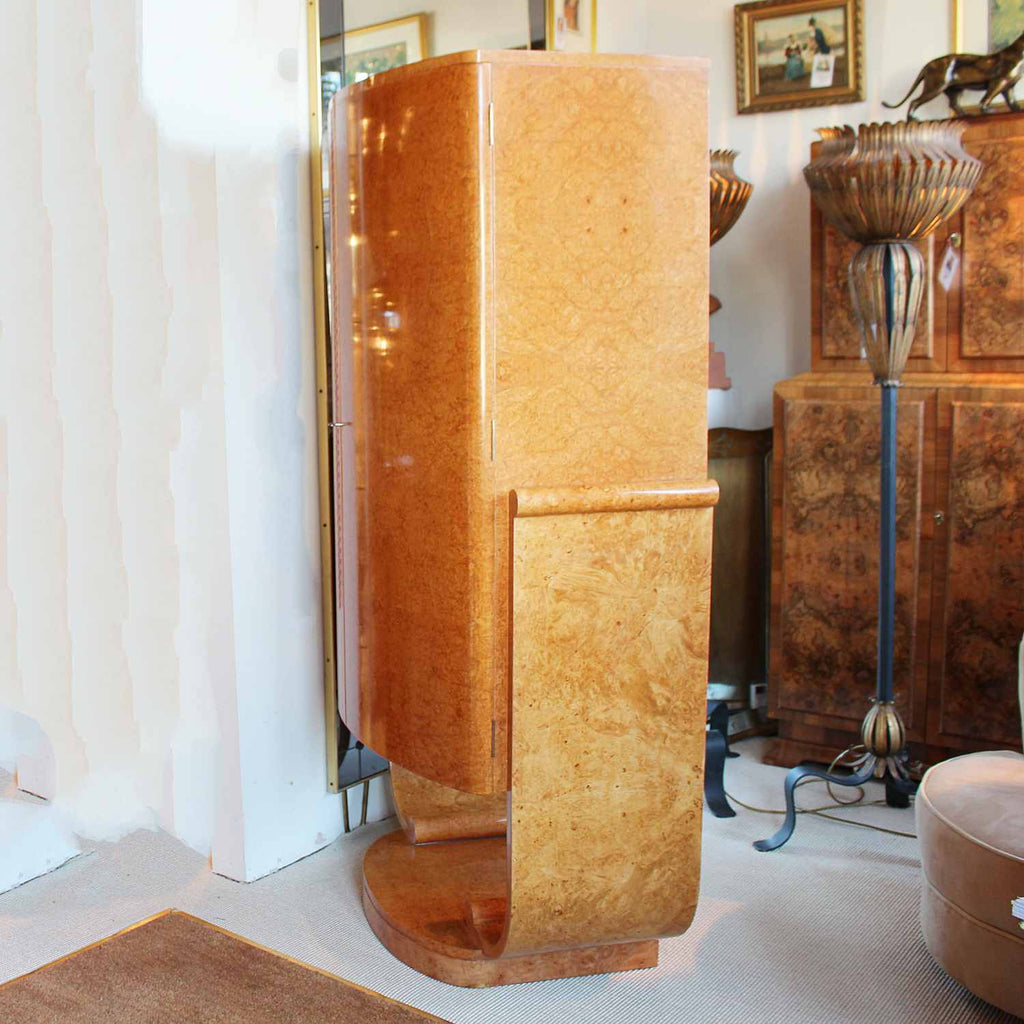 Art Deco cocktail cabinet by Harry & Lou Epstein with bow front and peach glass interior at Jeroen Markies