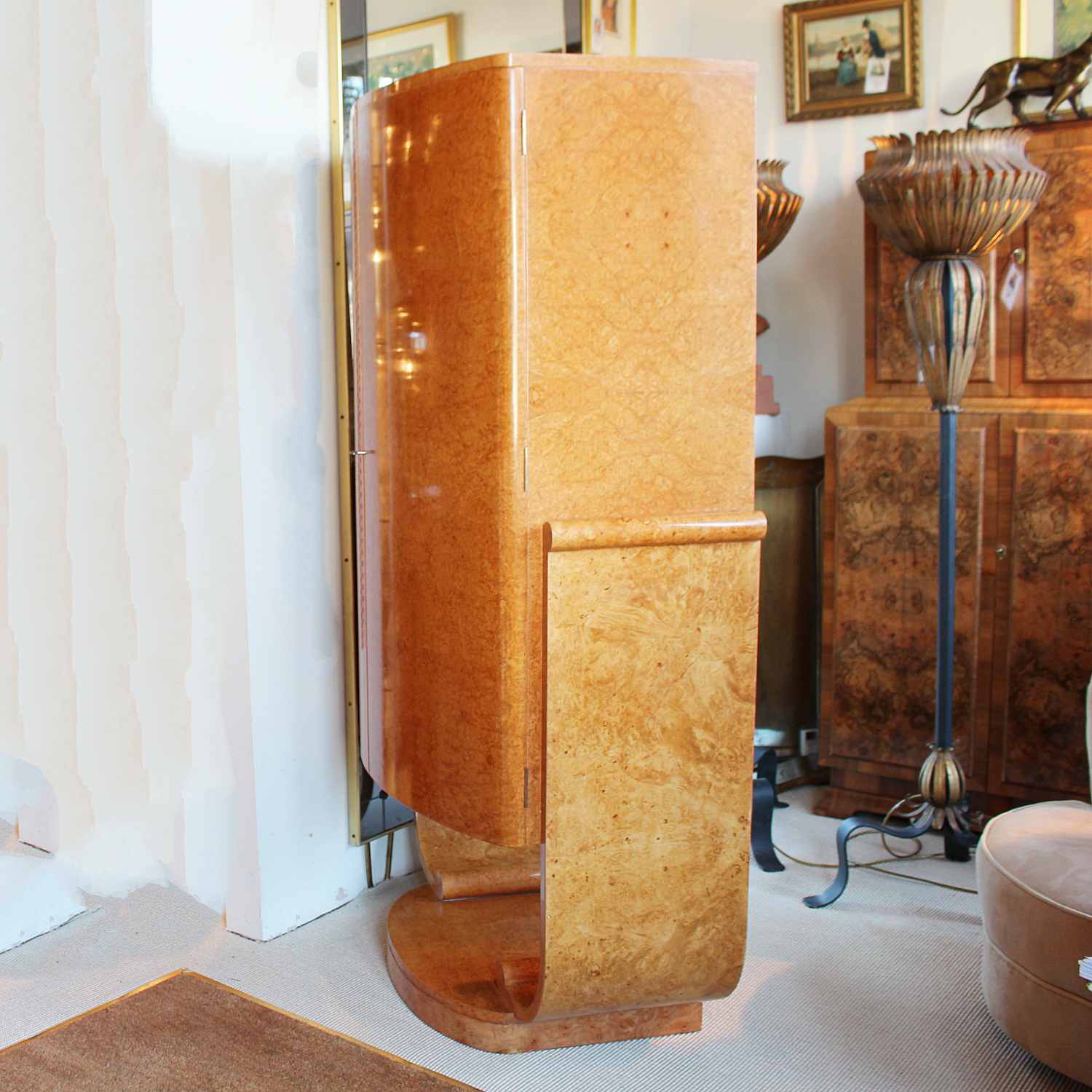 Art Deco cocktail cabinet by Harry & Lou Epstein with bow front and peach glass interior at Jeroen Markies