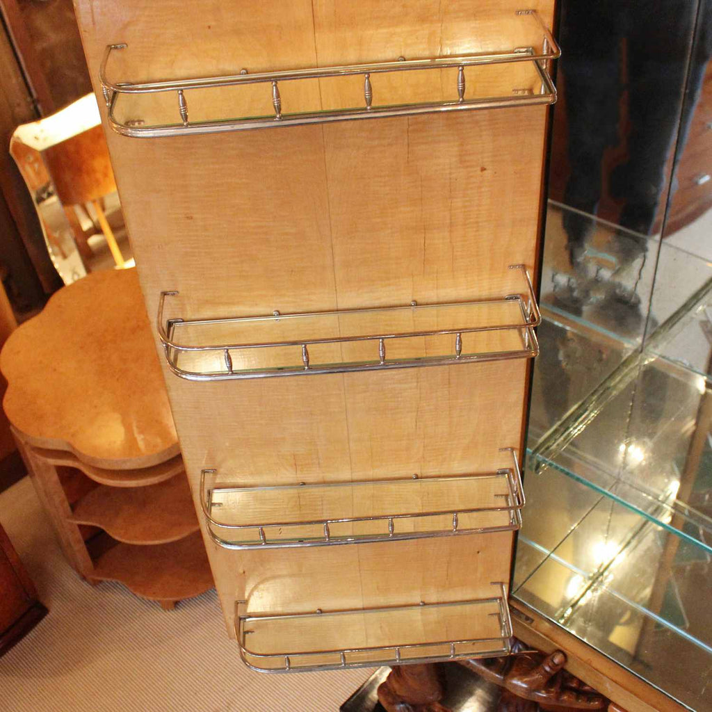 An unusual and unique Art Deco cocktail cabinet with hand carved monkeys