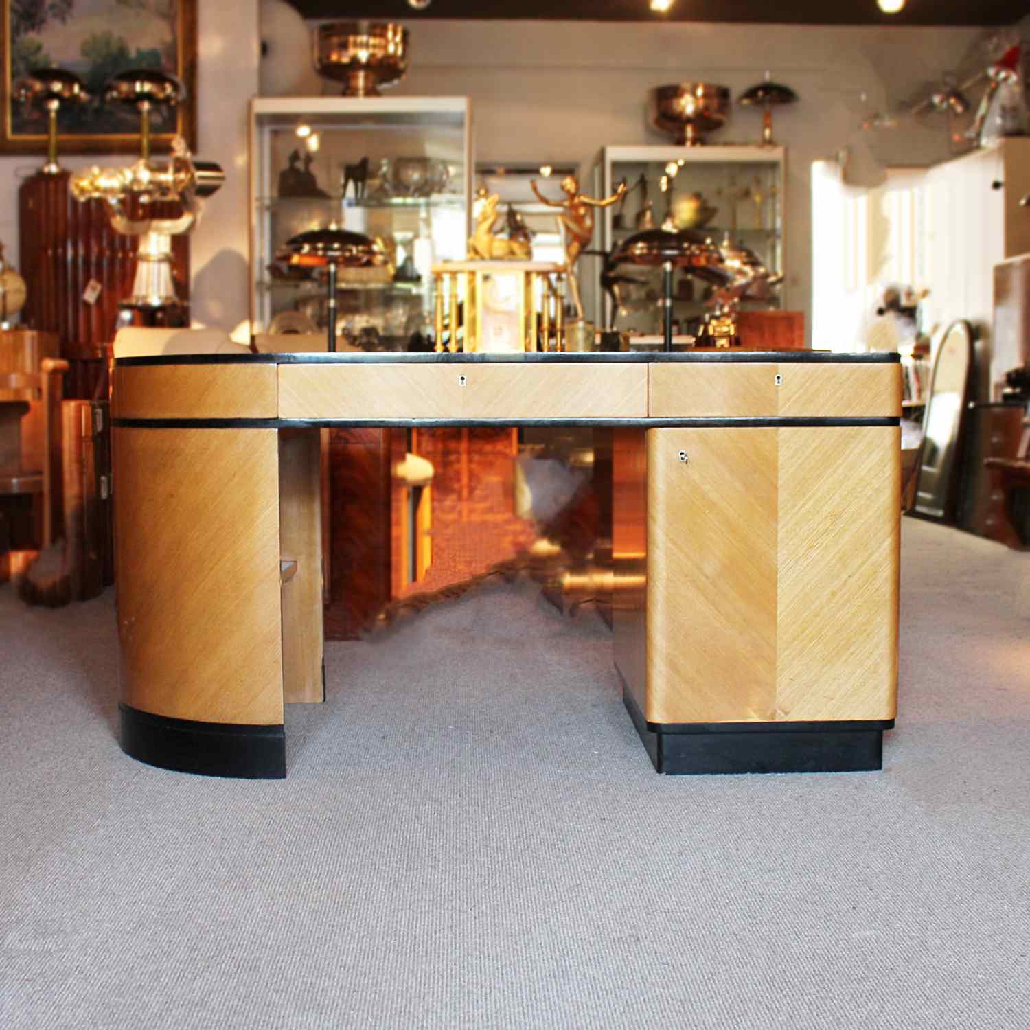 Art Deco desk with curved end in satin birch with ebonised wood at Jeroen Markies 