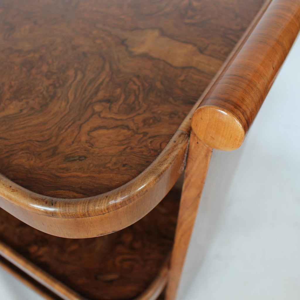 An Art Deco serving trolley with three shelves in burr walnut at Jeroen Markies