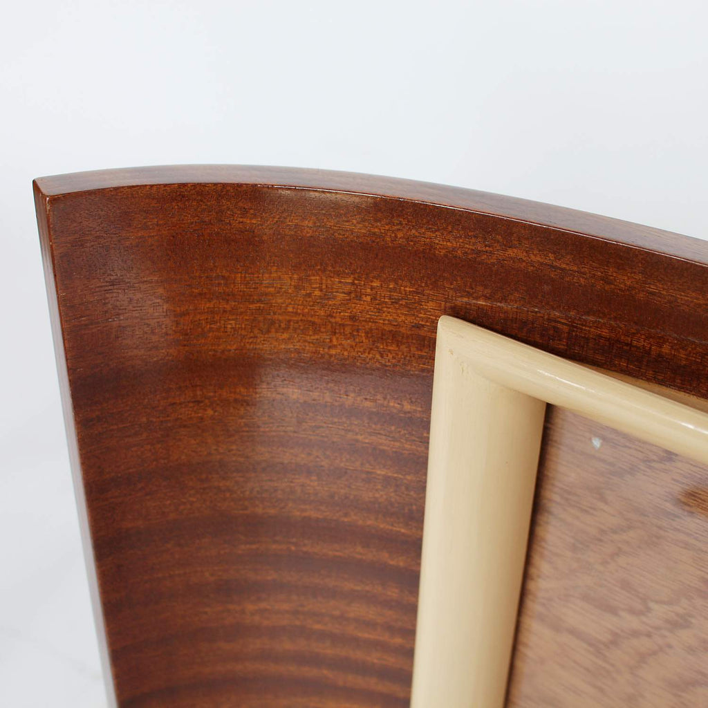 A pair of Art Deco curved wooden frames circa 1935