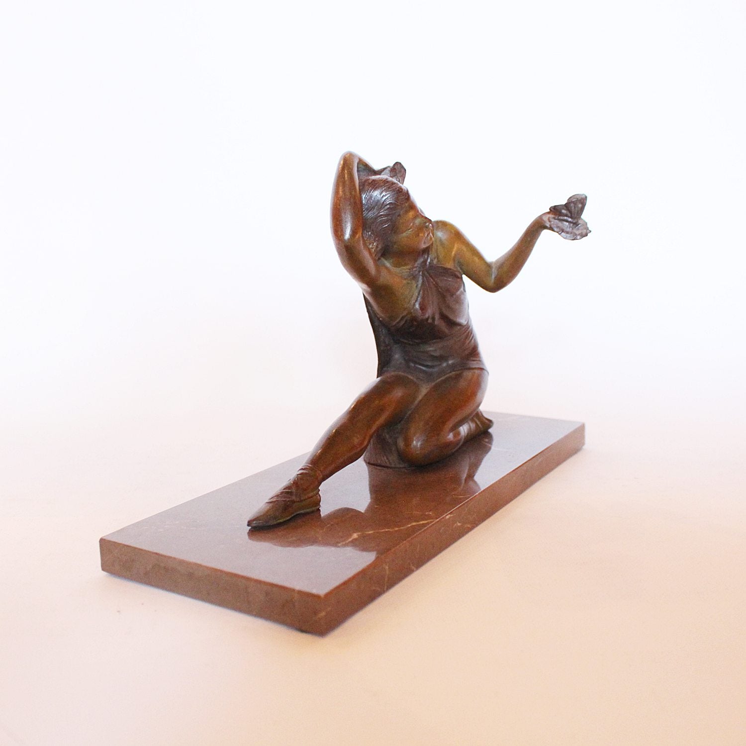 Art Deco spelter sculpture of a girl with butterfly at Jeroen Markies