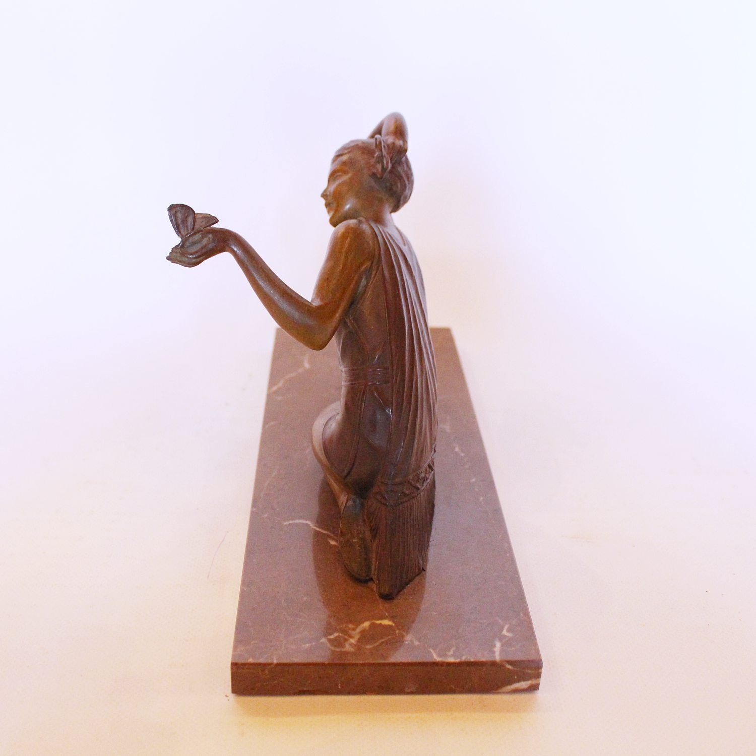 Art Deco spelter sculpture of a girl with butterfly at Jeroen Markies