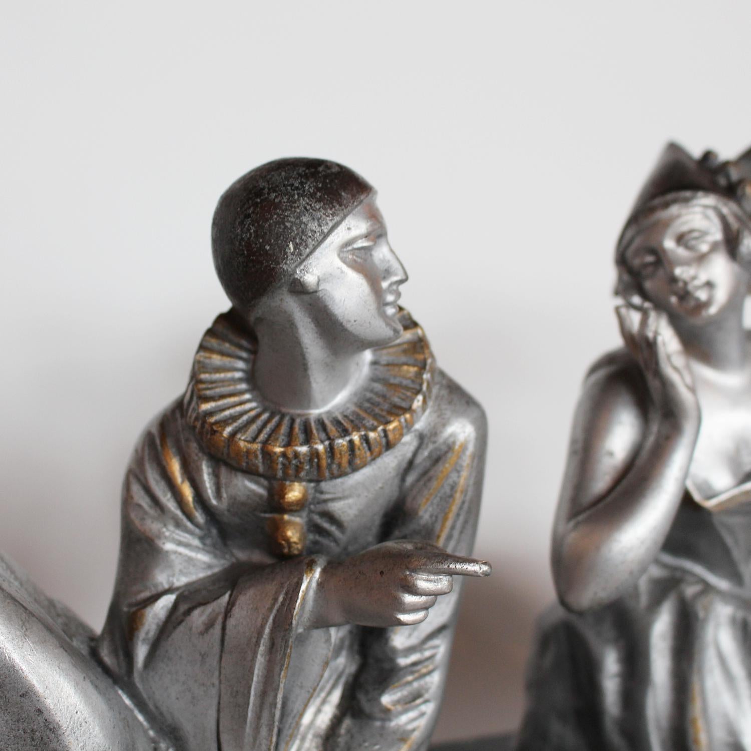Art Deco cold painted spelter Pierrot and Columbine bookends at Jeroen Markies