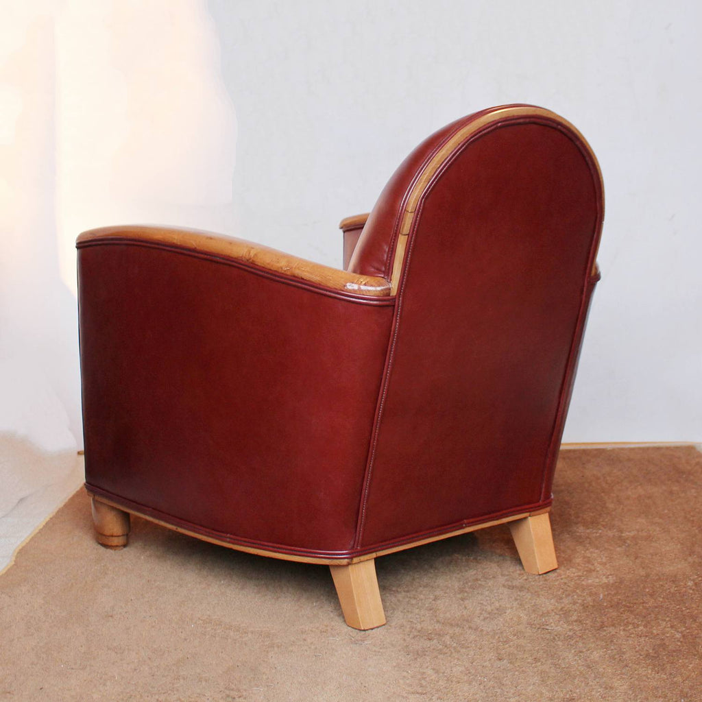 Art Deco tub chairs with fruit wood arms upholstered in chestnut leather at Jeroen Markies