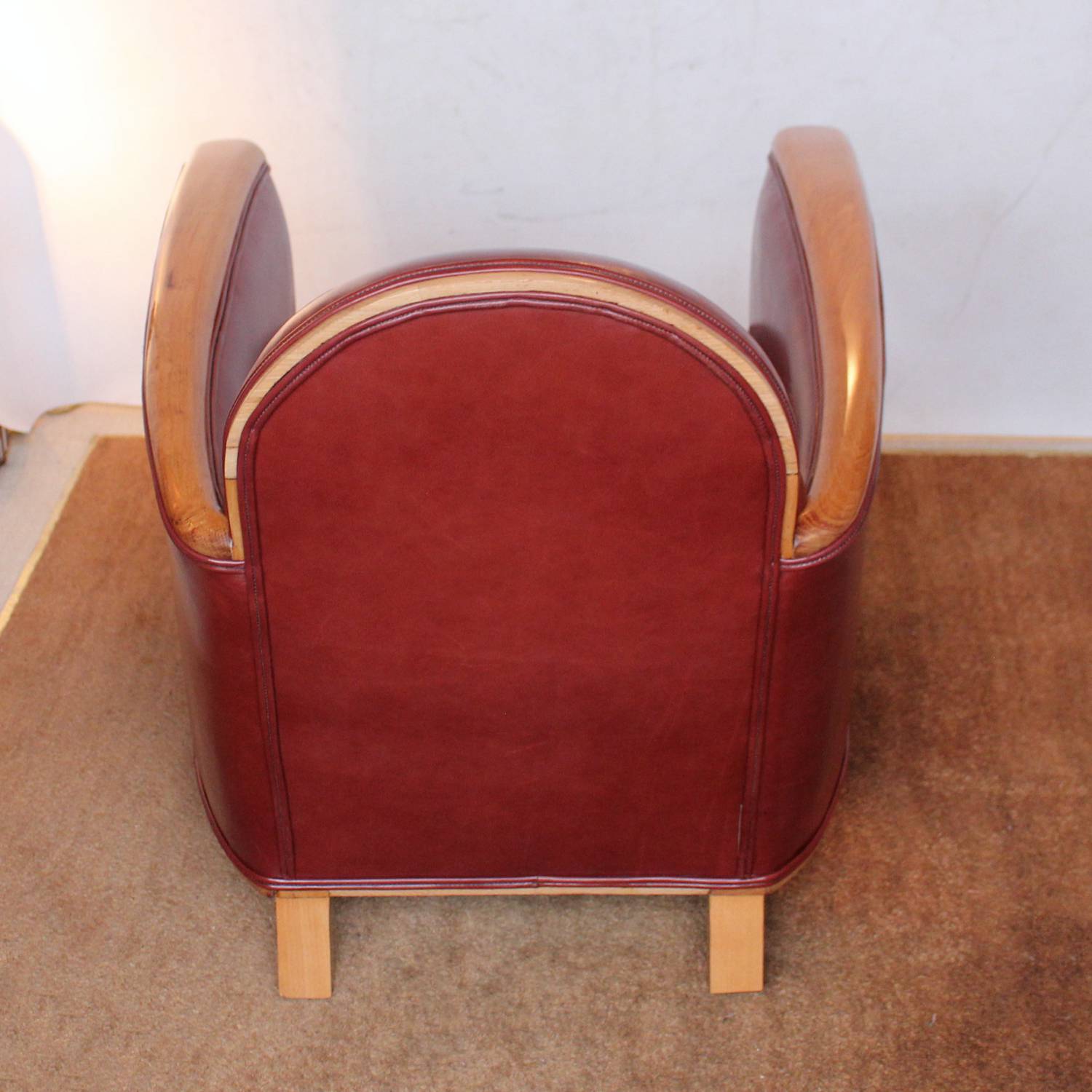Art Deco tub chairs with fruit wood arms upholstered in chestnut leather at Jeroen Markies