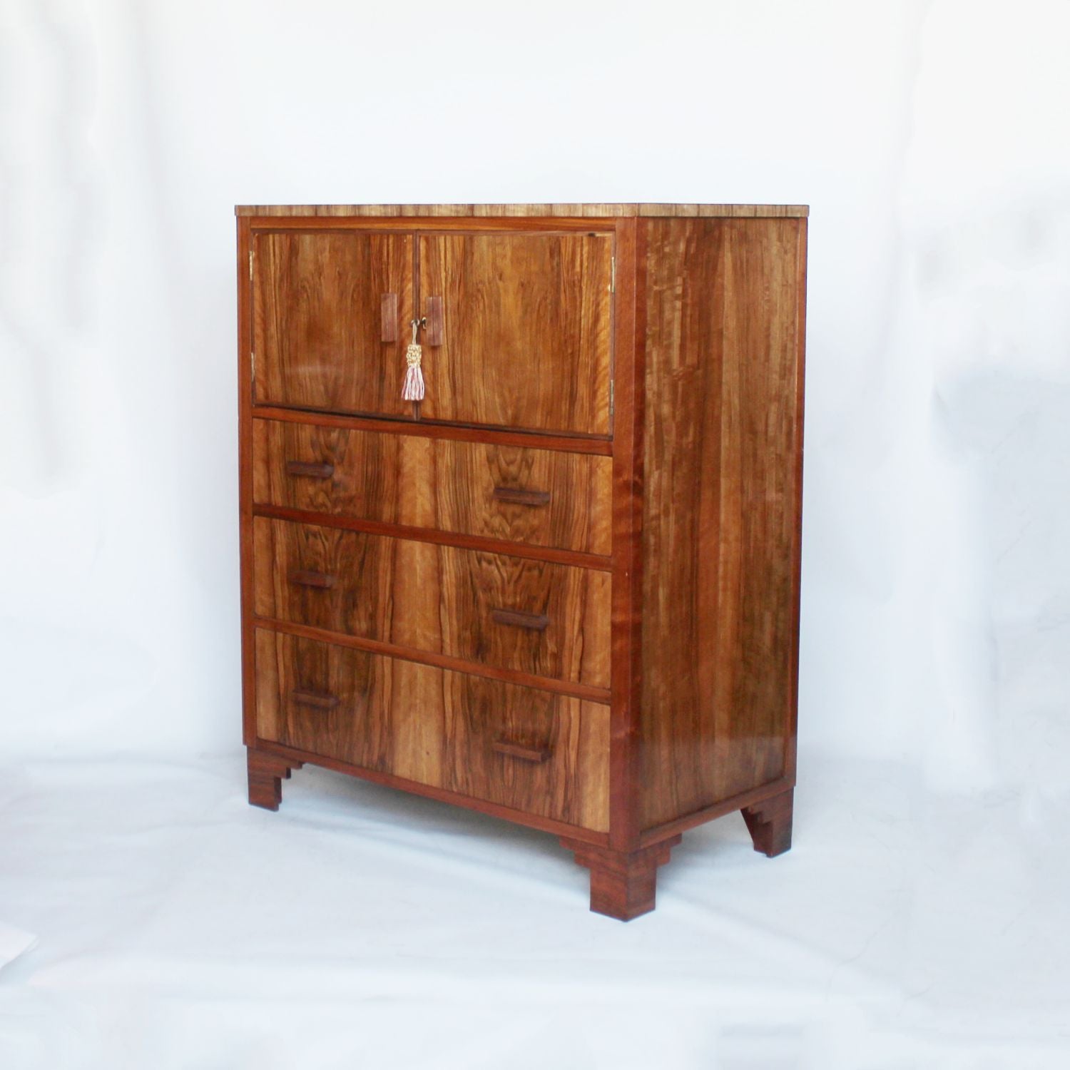 An Art Deco chest with cabinet to top in figured walnut at Jeroen Markies