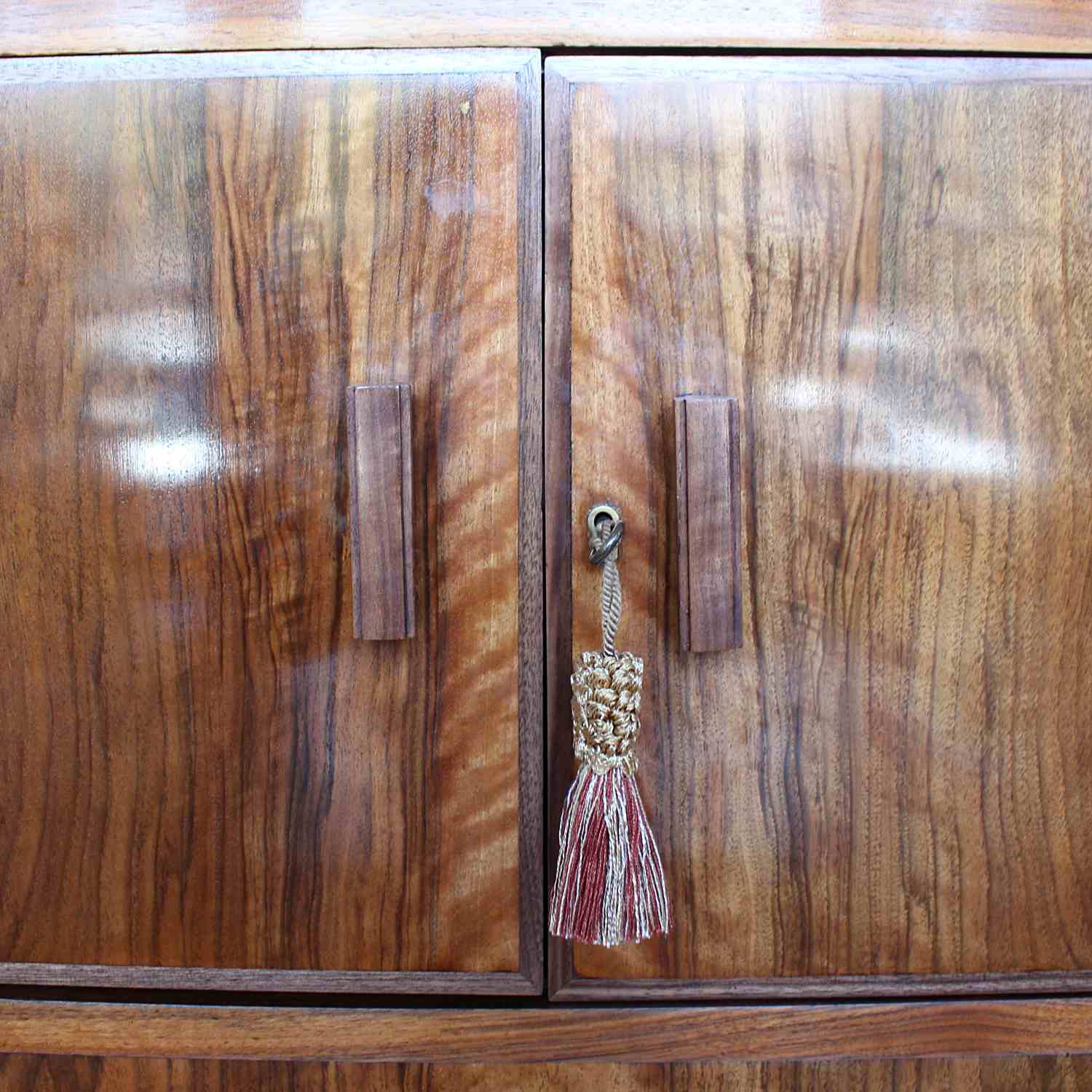 An Art Deco chest with cabinet to top in figured walnut at Jeroen Markies