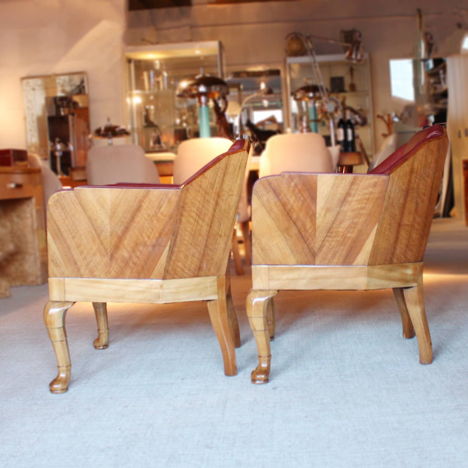 Art Deco side chairs in chestnut leather with curved walnut legs at Jeroen Markies