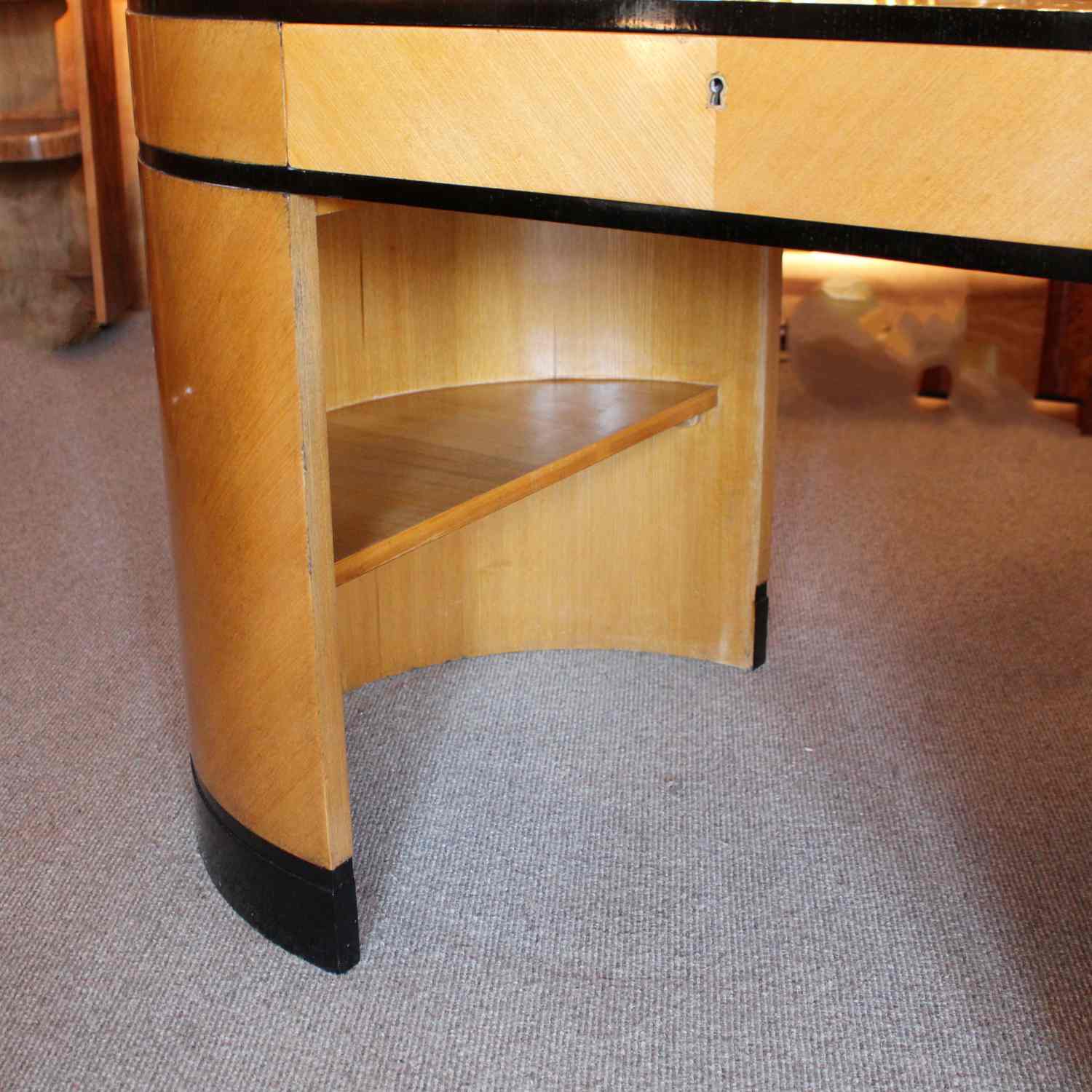 Art Deco desk with curved end in satin birch with ebonised wood at Jeroen Markies 