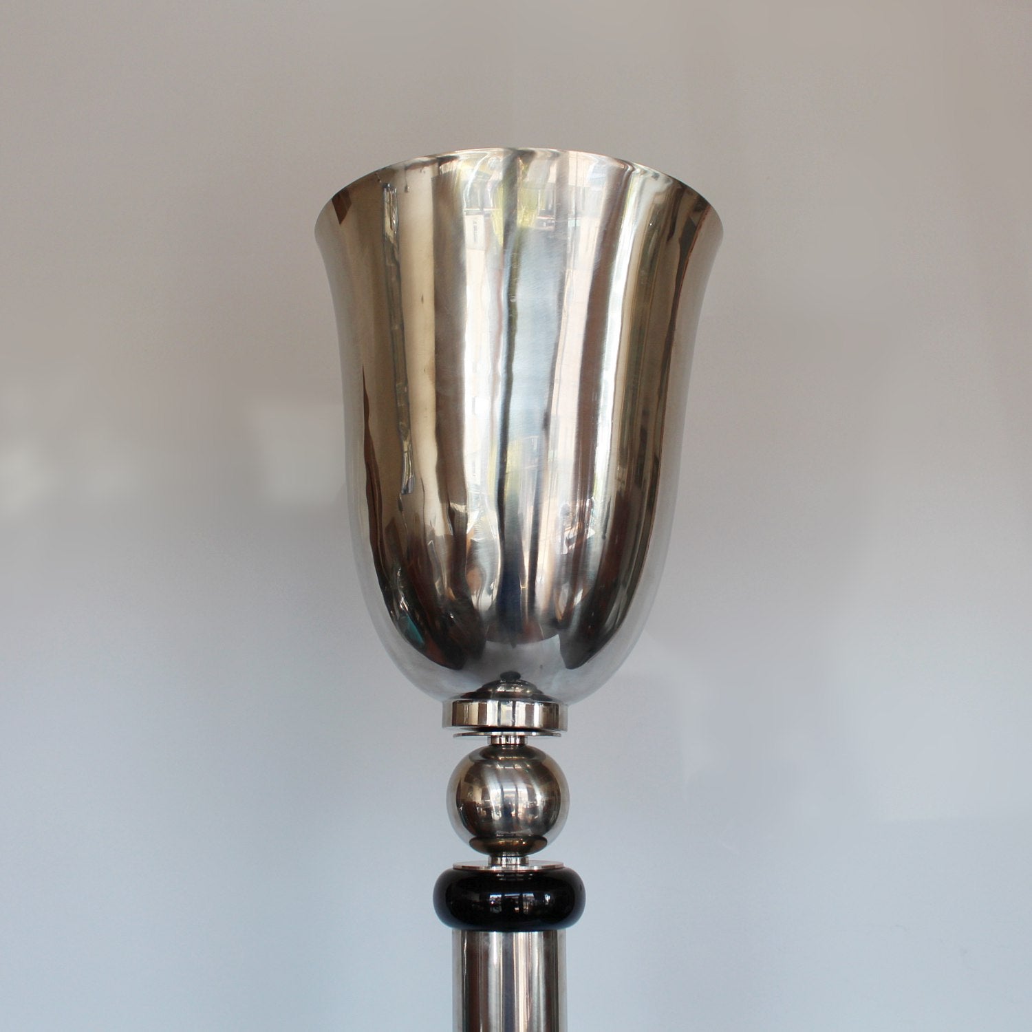 An Art Deco uplighter torchiere floor lamp in chromed metal and black bakelite at Jeroen Markies 