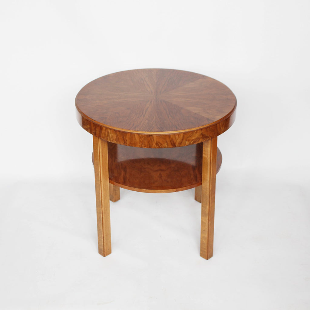 An Art Deco circular side table with shelf circa 1930