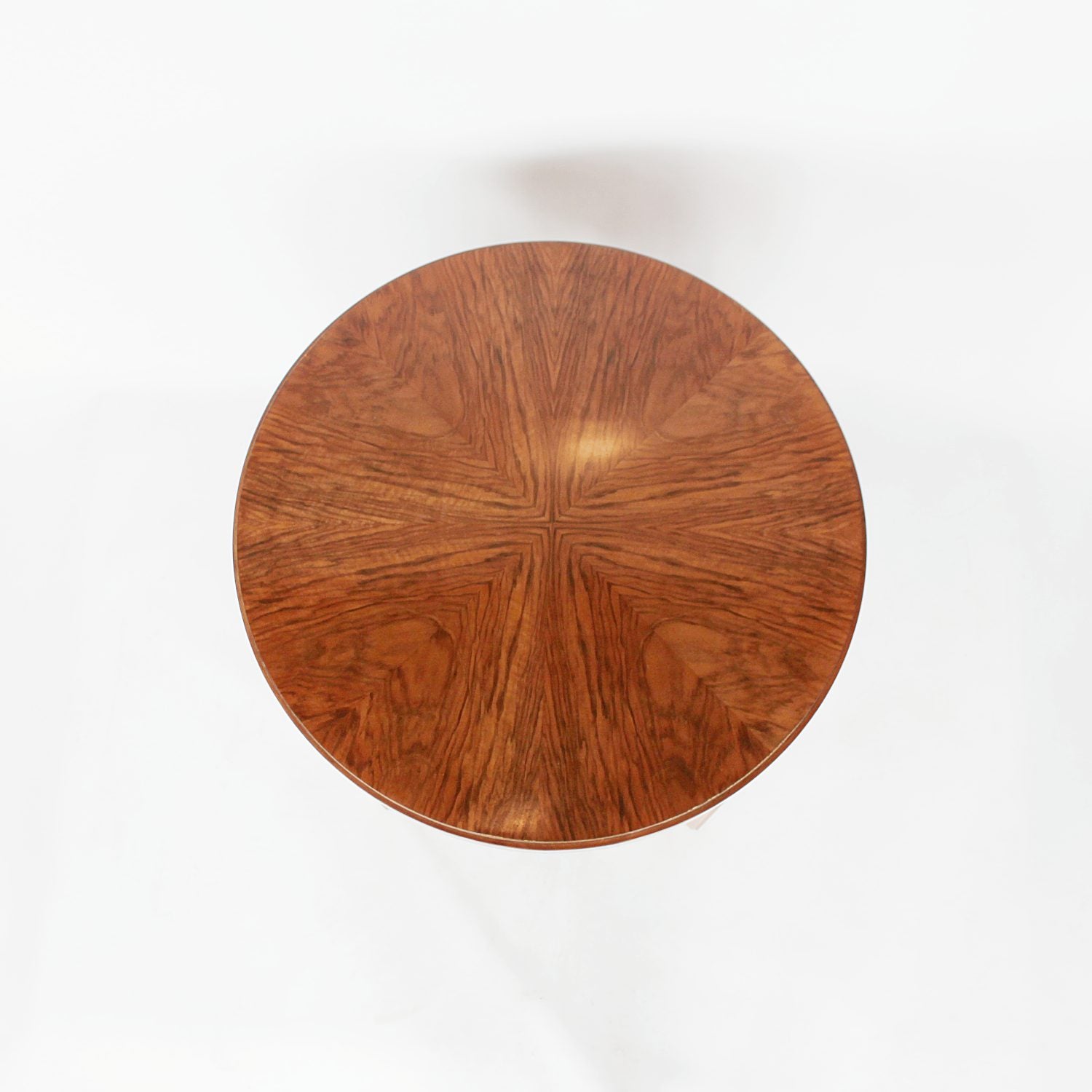 An Art Deco circular side table with shelf circa 1930